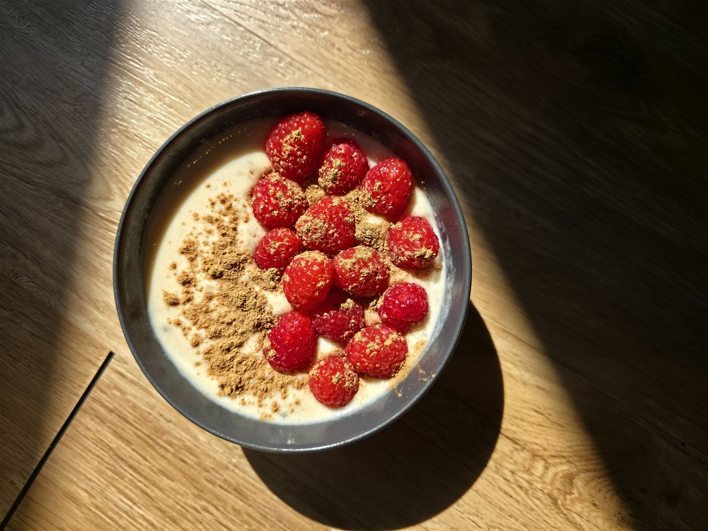 High-protein rice pudding with almond milk, raspberries and cinnamon — Bahri Performance